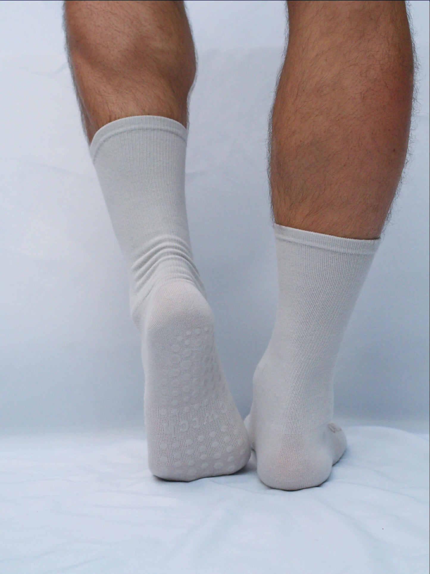 grey running socks with grips.